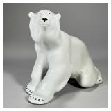 WHITE CERAMIC BEAR | White ceramic bear with stains in the rear. - l. 12 x w. 7 x h. 10 1/2 in  Cont