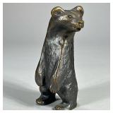 SMALL BRASS BEAR SCULPTURE | Brass standing brass bear figurine, artist signed on back. - l. 3 x w. 