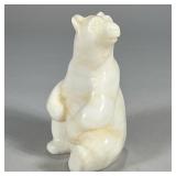 STONE CARVED BEAR | White stone carved seated bear figurine. - l. 4 x w. 3.25 x h. 6 in  Contact All