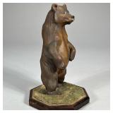 LOUIS PAUL JONAS CERAMIC BEAR SCULPTURE | Painted & mounted ceramic bear figure on wood base, signed