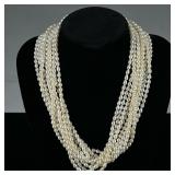 BAROQUE PEARL & STERLING NECKLACE | Designed as a 10-string 4.4mm baroque Pearl necklace with sterli