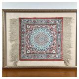 FRAMED MINIATURE RUG | Having colorful central medallion with flower border. - l. 21 x w. 16 in