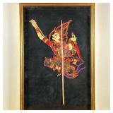 CUT LEATHER SHADOW PUPPET | Painted leather cut shadow puppet figurine mounted on stick and framed i