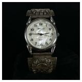 ANASAZI WRISTWATCH WITH STERLING BAND | Anasazi Quartz watch with mother of pearl dial and native fo