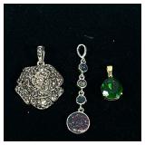 OPAL & STERLING AND OTHER PENDANTS | Designed as a sterling silver pendant with mounted circular opa