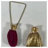 (2pc) ANTIQUE STYLE COIN PURSES | 2 antique style coin purses with engraved flip top and expanding c