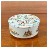 TIFFANY & CO. LIDDED BOWL | Having world map on lid with famous sites on side. - h. 2.5 x dia. 4 in