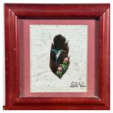 PAINTED HUMMINGBIRD FEATHER | Framed and painted hummingbird feathers depicting hummingbirds. -l. 6.