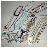 LARGE LOT COSTUME JEWLERY | Including various necklaces, pins and brooches, rings, earrings and more