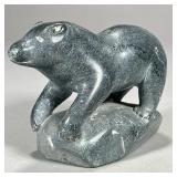 INUIT STONE CARVED BEAR | Carved stone bear on stone mount, sticker on bottom “Eskimo art”. - l. 6 x