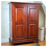 FEDERAL STYLE PANELED ARMOIRE | Double doors revealing inner shelves and fitted drawers, over bun fe