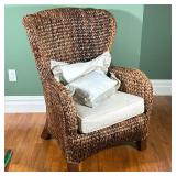 Wicker Wingback Chair | Wicker high back armchair with a beige seat cushion. - l. 29 x w. 29 x h. 41