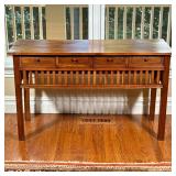 Four Drawer Console Table | Wood console/side table with four drawers over an openwork apron, on str