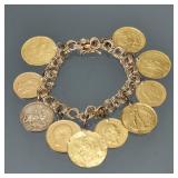 ANTIQUE GOLD COIN CHARM BRACELET | Designed as 10 early European gold coins with soldered bails susp