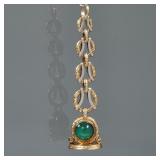 A CHALCEDONY CABOCHON & ENGRAVED 14K GOLD WATCH FOB | Designed as a pair of green chalcedony cabocho