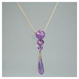 MCM AMETHYST ORB & GOLD PENDANT NECKLACE | Designed as three graduated carved amethyst spheres mount