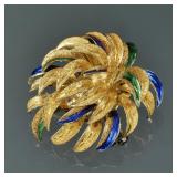 ENAMEL & 18K GOLD PIN | Italian, designed as textured gold leaves with gold and blue enamel, marked 