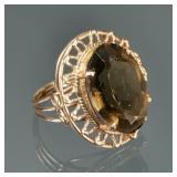 SMOKEY QUARTZ & GOLD ROPEWORK RING | An oval faceted smokey quartz set in yellow gold; size 6, 6.4g