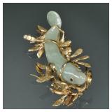 CARVED JADE FISH & 14K GOLD MOUNTED PENDANT | Designed as a carved jade fish set in a 14k yellow gol