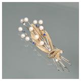 PEARL, SAPPHIRE, DIAMOND, & 14K GOLD BROOCH | Designed as 14 karat white gold sprays mounting 11 rou