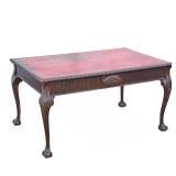 CHIPPENDALE CARVED LEATHER TOP BUREAU PLAT | An impressive carved desk with an inset red leather top
