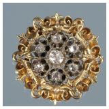 ANTIQUE FLOWER HEAD BROOCH | Designed as a round gold openwork gallery with engraved scrolls, ropewo