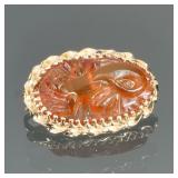 CARVED AMBER & 14K GOLD PIN | Designed as an oval carved Amber pin with a lizard or salamander in hi