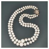 WHITE CORAL & 14K GOLD GRADUATED DOUBLE STRAND NECKLACE | Designed as two hand, strong lines of grad