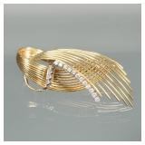 DIAMOND & 18K GOLD CONTEMPORARY PIN | Designed as a line of 12 prong-set melee diamonds and a line o