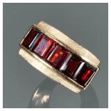 GARNET & 14K GOLD RING | Designed as five nicely matched channel set garnets (6 x 4.75 x 3 mm, each 