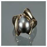 LIMOGE BAROQUE SEED PEARL & 14K GOLD RING | Designed as a central baroque pearl (14.5 x dia. 10.25 m