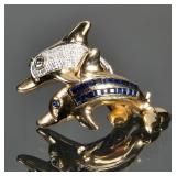 SAPPHIRE, DIAMOND, & 14K GOLD DOLPHIN PIN | Designed as two dolphins, one diamond-encrusted, the oth