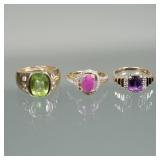 (3pc) 14K GOLD & GEMSTONE RINGS | Including an oval mixed cut green stone (11.8mm long) set with six