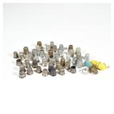 COLLECTION STERLING & OTHER THIMBLES | A collection of antique and later thimbles, including five st
