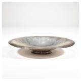 HAMMERED SILVER BOWL | Designed as a low form bowl tested to silver, with unidentified hallmark, dia