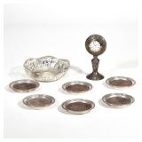MISC. SILVER OBJECTS | Including a set of six wood-lined sterling coasters, an openwork bowl marked 