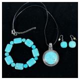 (3pc) TURQUOISE JEWELRY | Including: pair of round turquoise earrings, necklace with round carved tu