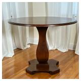ROUND PEDESTAL TABLE | Having circular wood top over carved pedestal base. - h. 31 x dia. 39 in