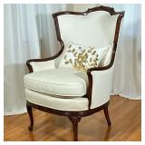 LOUIS XV STYLE BERGERE ARMCHAIR | Having carved back with floral relief carving over carved cabriole