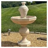 COMPOSITE OUTDOOR FOUNTAIN | Having formed composite vase with lion head relief over octagonal basin