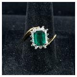 18K GOLD PLATED RING | Designed as an 18K gold plated ring with mounted stones, size 7.5, marked “18