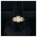 OPAL & MIXED METAL RING | Designed as a mixed metal ring (no apparent markings) with mounted Opal, s