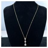 STERLING & DIAMOND SIMULANT NECKLACE | Designed as a gold-toned sterling silver necklace with silver