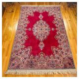 RED MEDALLION KARASTAN RUG | Karastan red medallion Kirman rug having red backing with large colorfu