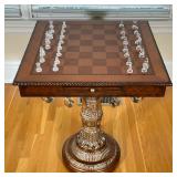 WOOD GAMES TABLE | Having inlaid chess board top over bronze painted composition pedestal base. - h.