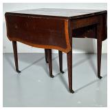 DROP LEAF EXTENDING TABLE | Drop leaf wood table with 3 12in leaves. - h. 29 x w. 39 x l. 46 in