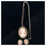 CAMEO JEWELRY | Including: carved Cameo pendant/brooch with mixed metal chain, and pair of cameo cli