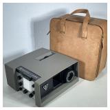 BAUSCH & LOMB BALOMATIC 655 SLIDE PROJECTOR | Balomatic 35mm slide projector by Bausch & Lomb in lea