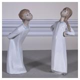(2pc) BOY & GIRL LLADRO FIGURINES | Including: "Girl Stretching" Lladro figurine, and "Kiss Me Goodn
