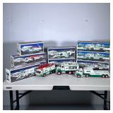 (12pc) HESS TRUCKS | Including: 2 Firetrucks, 2 Emergency Trucks, Toy Truck and Racecars, 2 Helicopt
